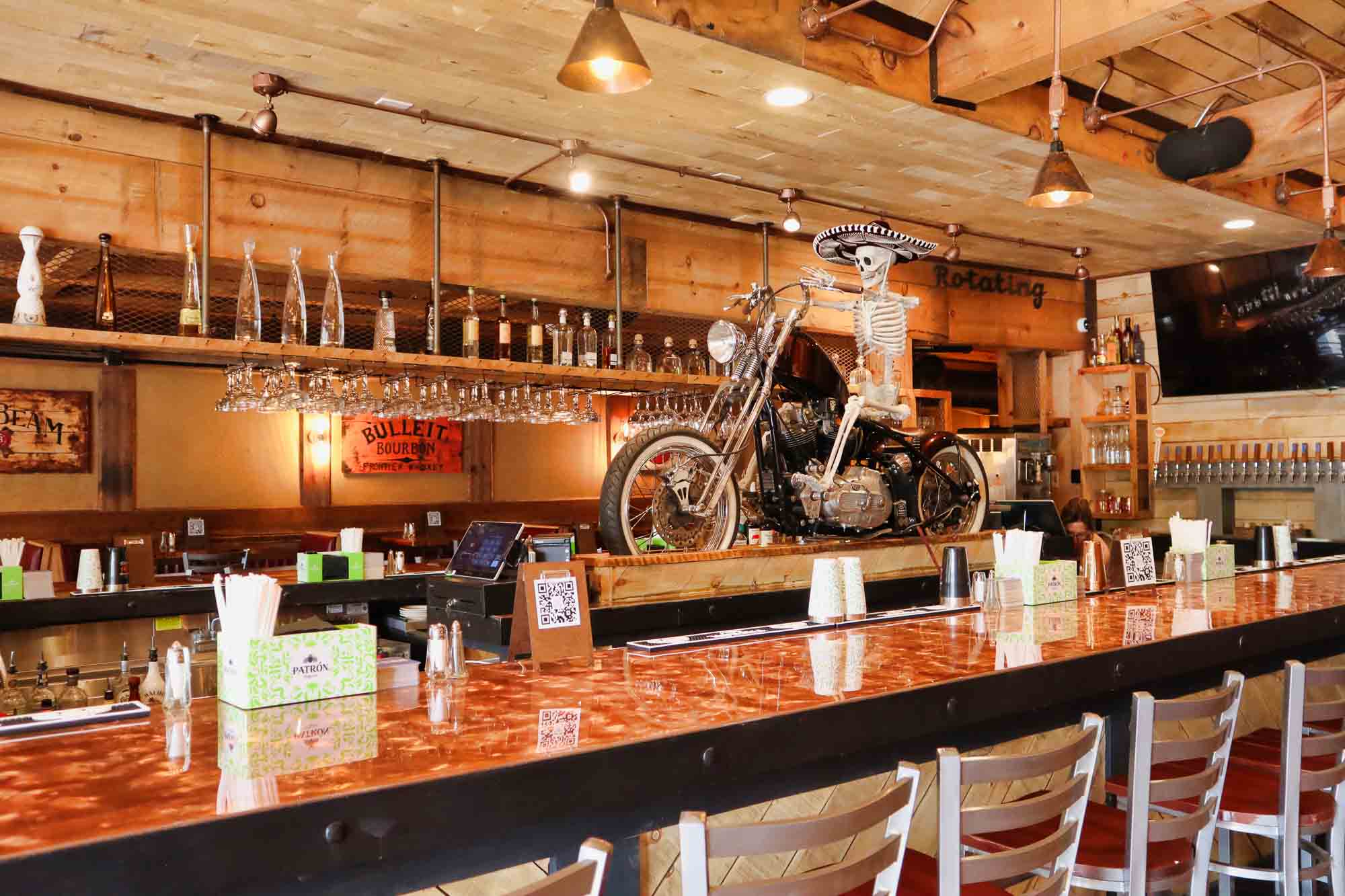 The bar featuring the iconic skeleton on a motorcycle